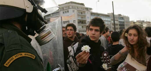 Young students offer flowers to riot police #griots